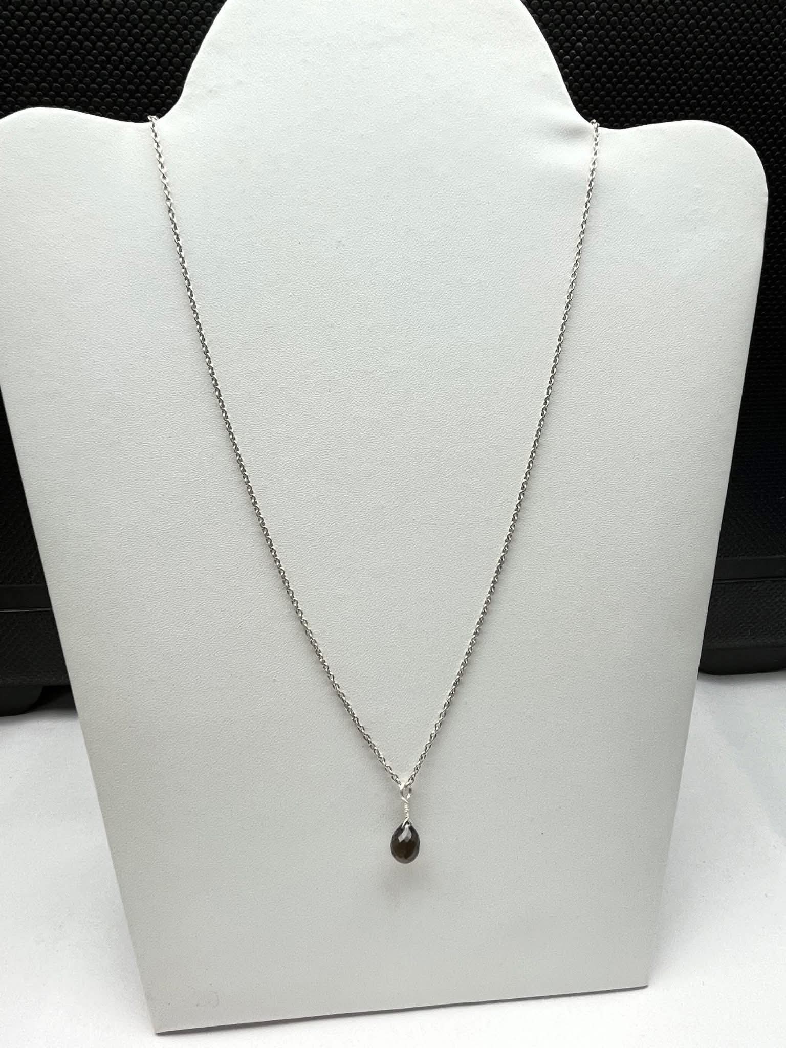 smoky quartz silver pendant hand made jewelry chain lenght-18 inch  genuine 92.5 silver chain shape: smoky quartz drop with faceted 7*10 mm  with hand made wooden jewelery box (to keep your jewelery safe) (include pendant,silver chain and wooden box) world wide shipping ,paypal accepted message me for more details