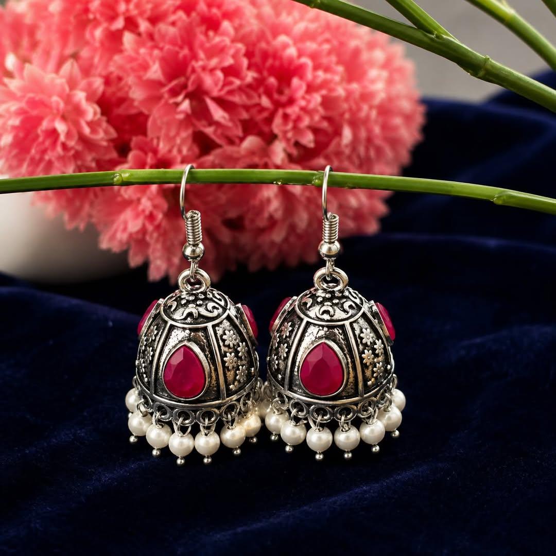 Product Details Name : new trendy jhumla earring's for women's and gril's || silver jhumka earring's|| Classic Stylish Statement Studs|| fastive & wedding wear earring's light wait jhumla #pink jhumki #silver jumki  Base Metal : Brass  Plating : Oxidised Silver  Sizing : Adjustable  Stone Type : Kundan  Type : Hoop Earrings  Net Quantity (N) : 1  "Introducing our latest collection of trendy jhumka earrings, designed for women and girls seeking elegance with a modern twist. Elevate your style with our stunning silver jhumka earrings, blending classic charm with contemporary flair. Our collection also features timeless statement studs, perfect for festive and wedding occasions. Crafted for comfort, these lightweight jhumkas offer effortless sophistication and grace to your ensemble."  Country of Origin : India